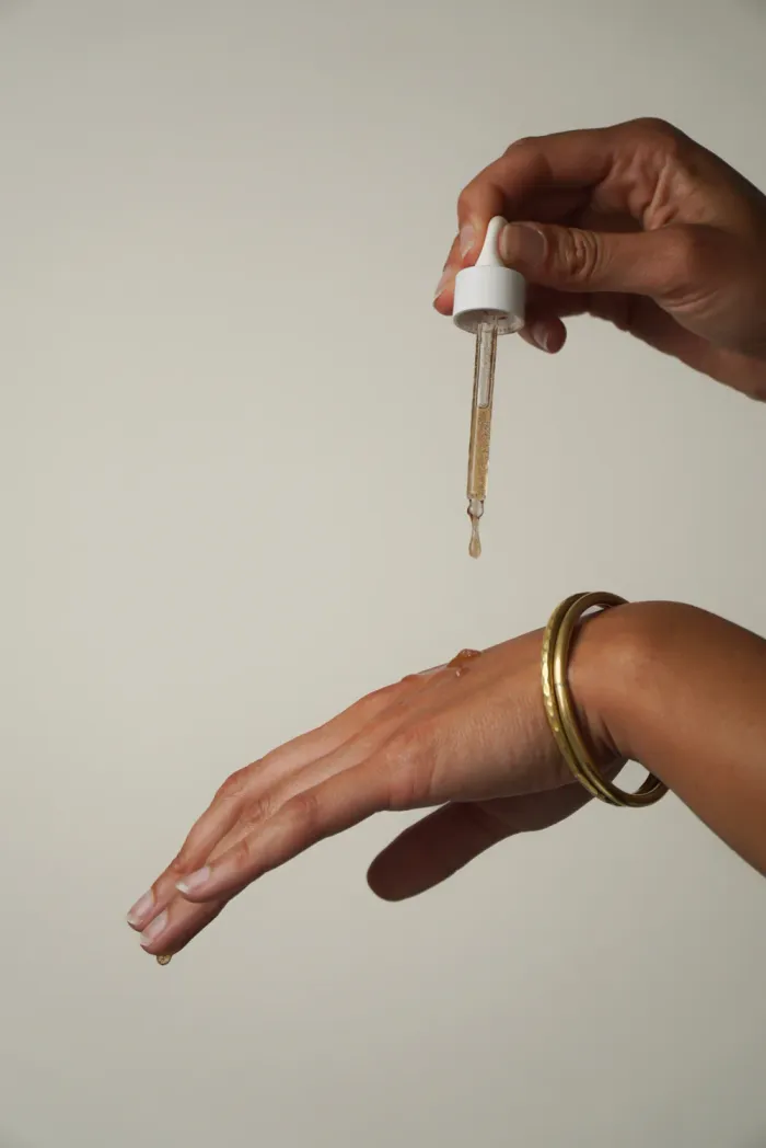 Applying natural serum or oil to hand skin